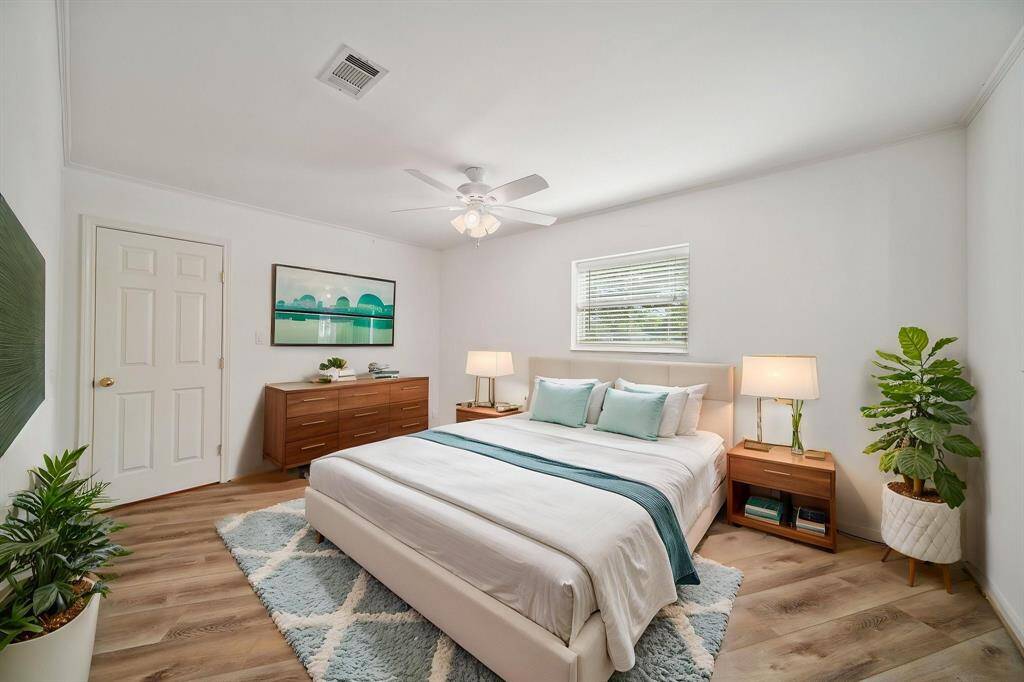 Virtual staged. Secondary bedroom can accommodate most furniture
