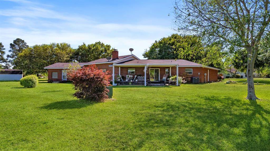 Lots of green space, home on two lots