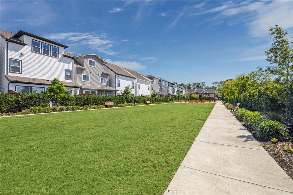 Enjoy the gated community pool, green space, dog park and gathering area. HOA includes water, sewer, valet trash pickup twice a week, front and backyard lawn maintenance.