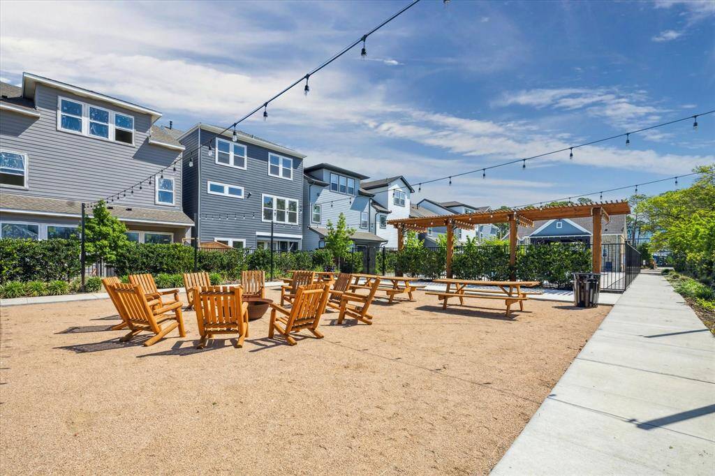 Enjoy the gated community pool, green space, dog park and gathering area. HOA includes water, sewer, valet trash pickup twice a week, front and backyard lawn maintenance.