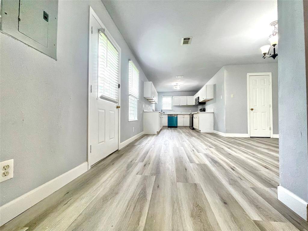 Living room with open kitchen floorplan