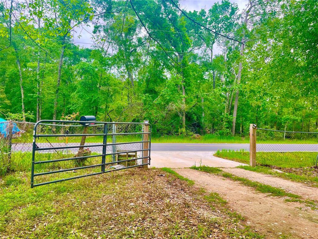 circle driveway with two gates
