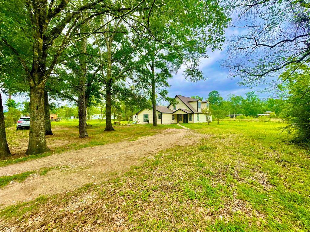 circle drive way with two gates, no back neighbor