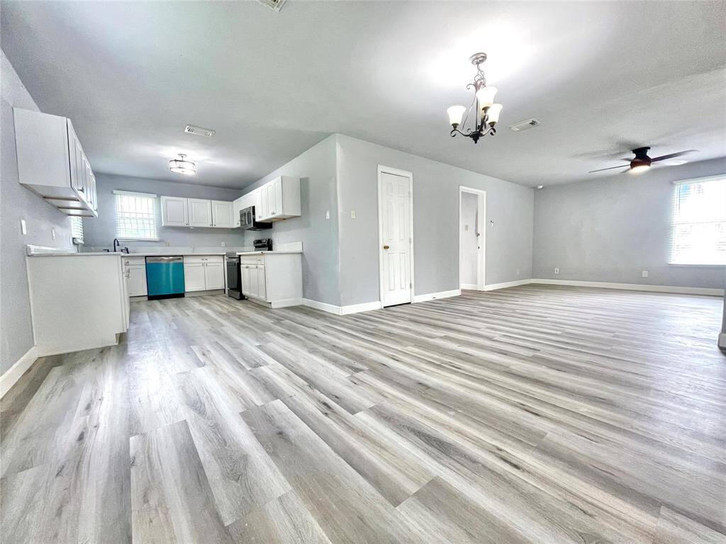 Living room with open kitchen floorplan