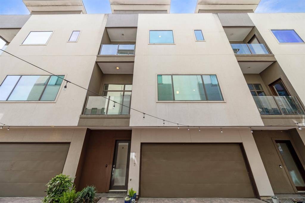 Welcome Home! Four-story home featuring two balconies and a rooftop terrace with breathtaking Downtown Houston views. New Roof 2024!