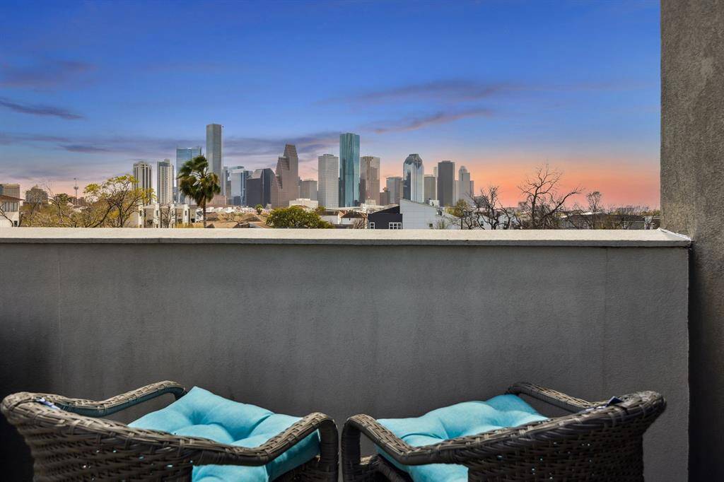 Relax and unwind each evening while taking in amazing downtown views from your private rooftop deck!