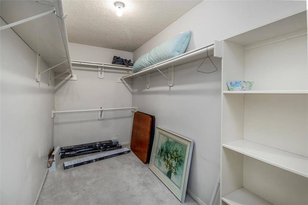 The primary bedroom features a large closet set off from the bathroom.