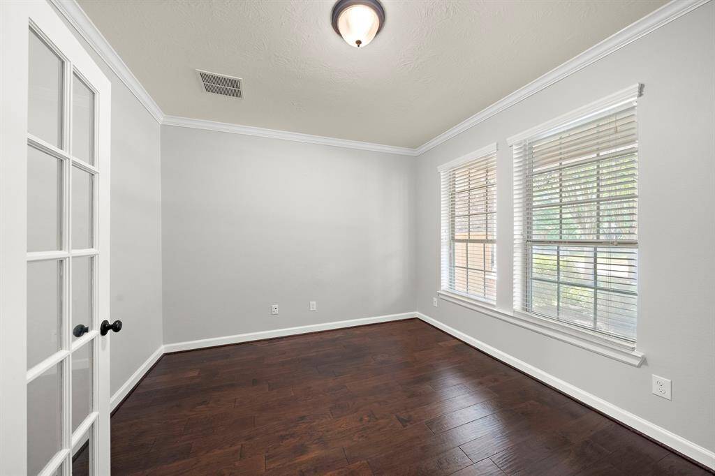 Office with large windows featuring so much natural light