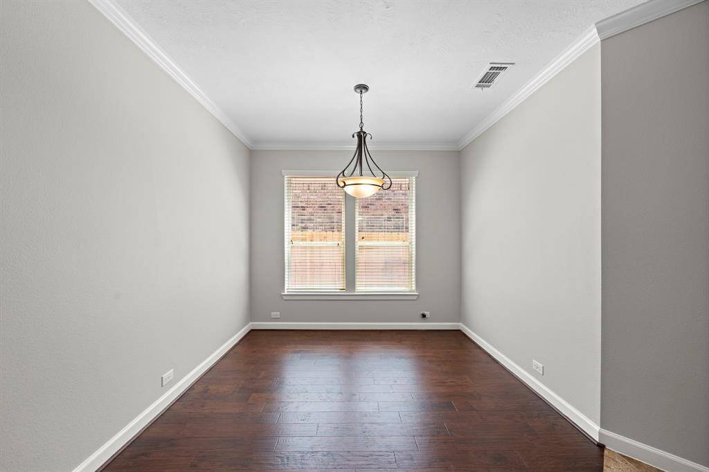 Formal dining room with beautiful hardwoods!