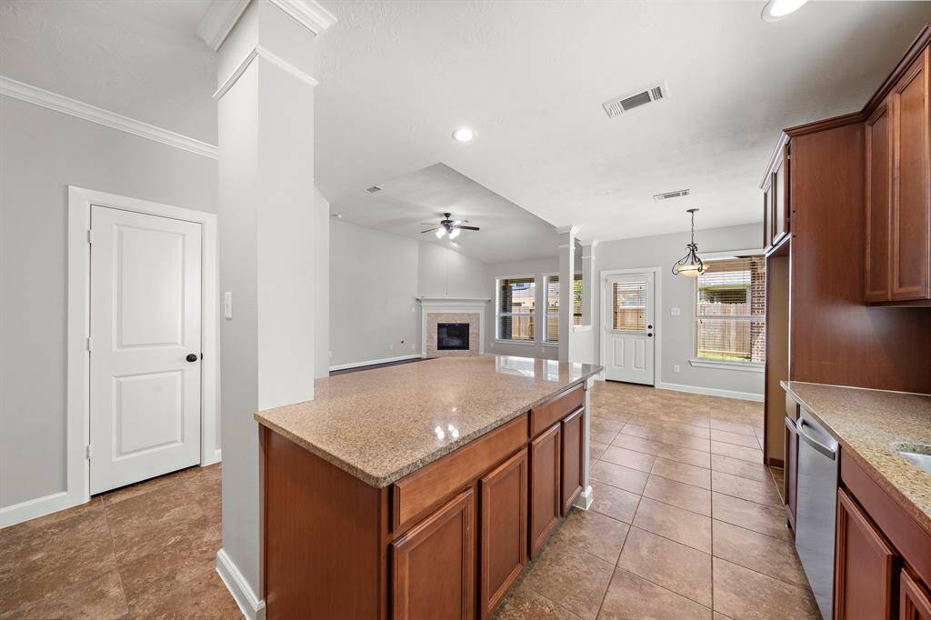 Kitchen open to breakfast area and family room.