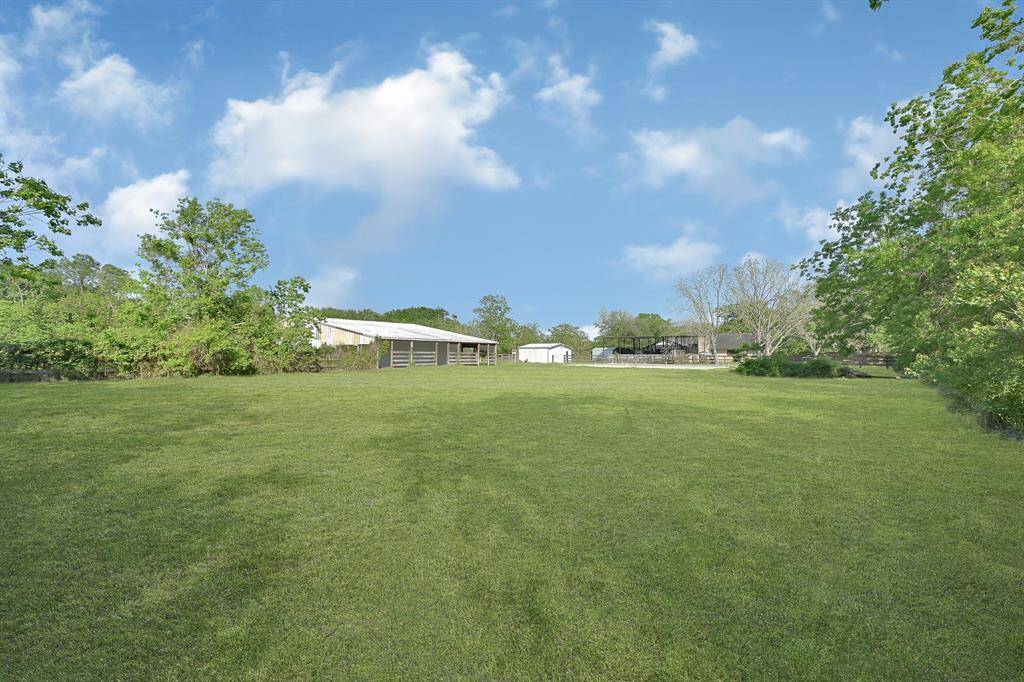 Endless possibilities await in this expansive backyard—perfect for creating your ideal outdoor escape, from play areas to patios and everything in between.