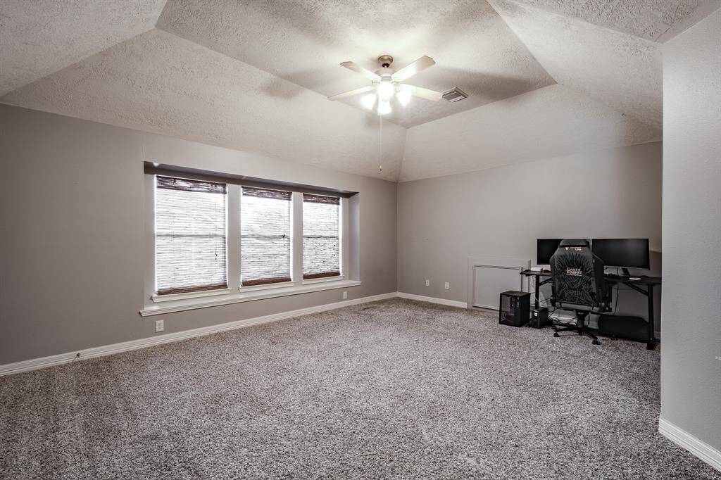 Bright and spacious game room, perfect for entertaining.