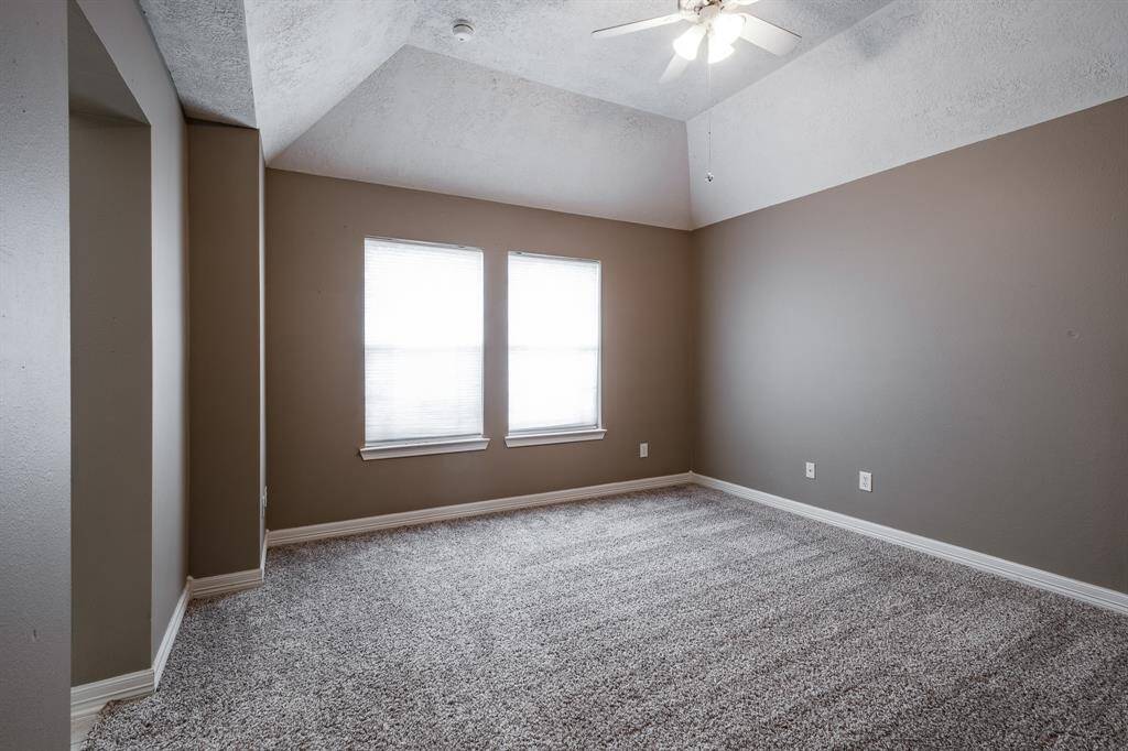 Secondary cozy bedroom with convenient Jack & Jill bath access.
