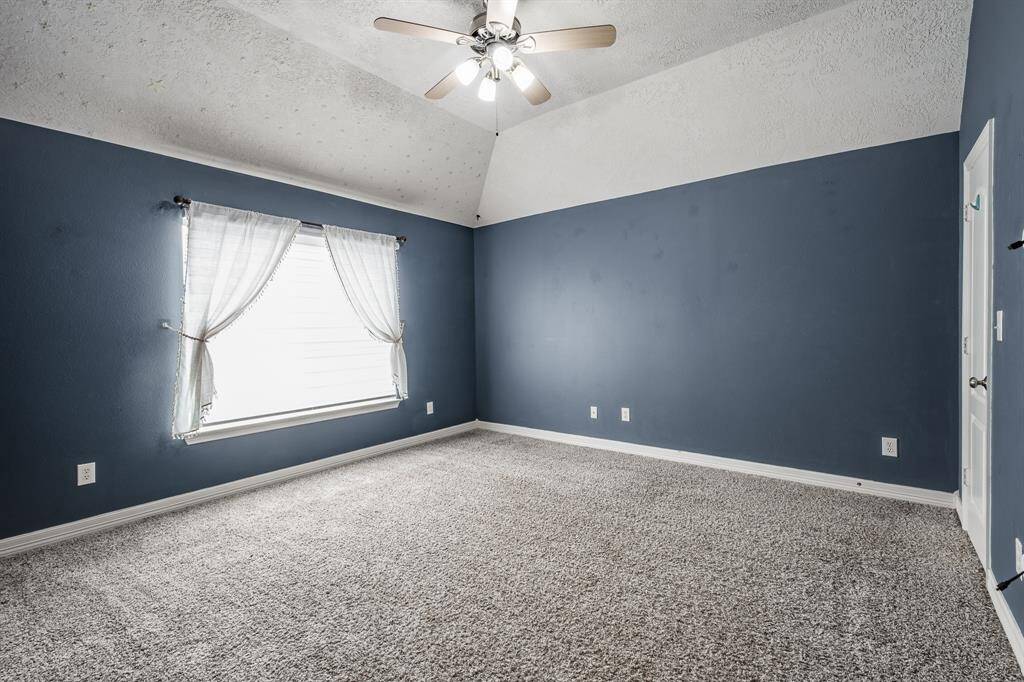 Secondary cozy bedroom with convenient Jack & Jill bath access.