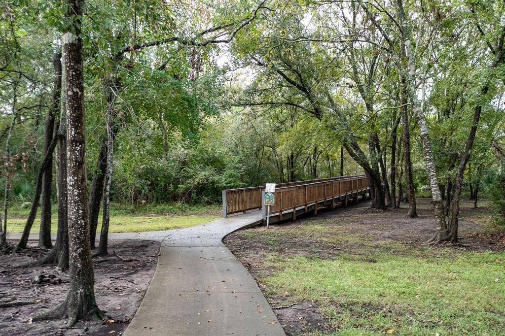 Enjoy scenic walks and serene views along the extensive trails by Clear Creek.