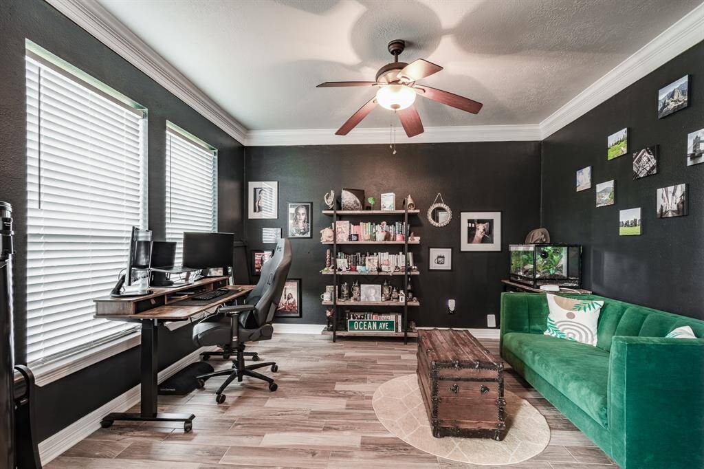 Versatile study/flex space featuring elegant French doors.