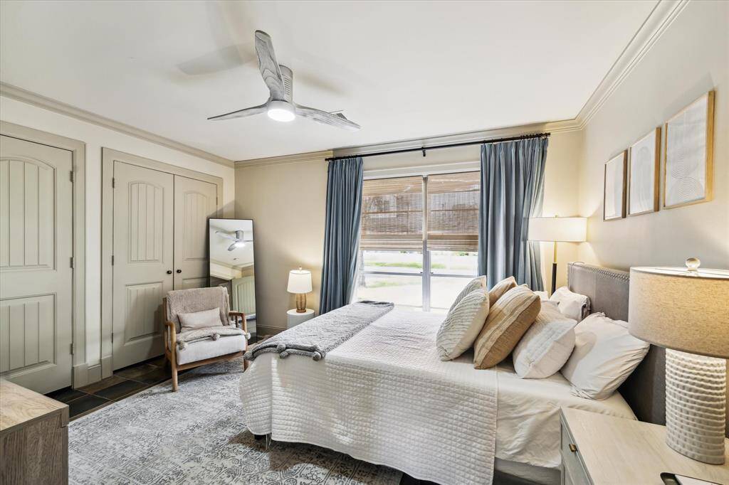 First bedroom featuring a seamlessly integrated built-in closet. Note, all the rooms that need great looking ceiling fans have them!