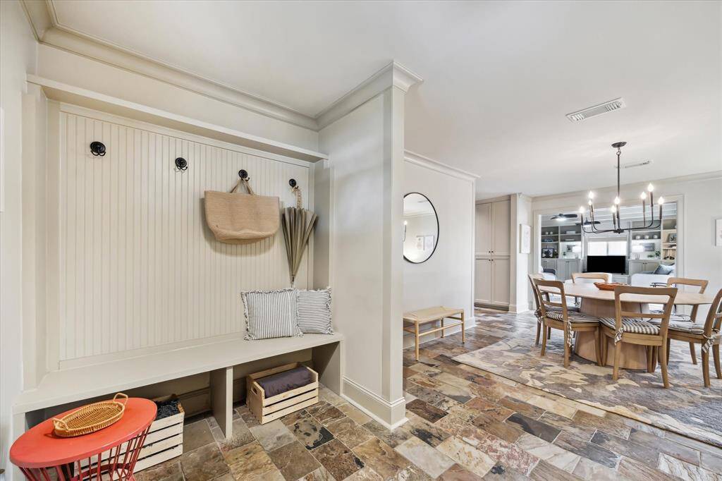 Upon entering, you'll feel right at home. First, the entry provides the perfect place for keeping you organized. The dining area beckons you in.