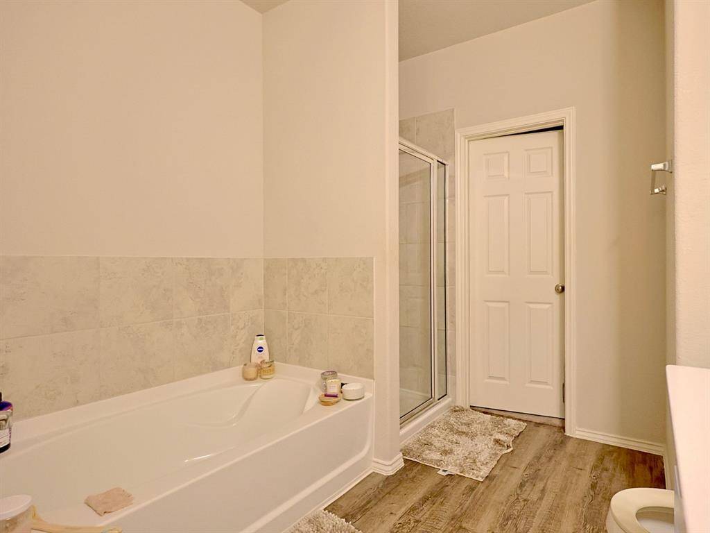 Primary Bathroom with Separate Tub and SHower