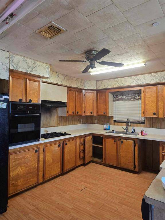 Large open kitchen with bar area