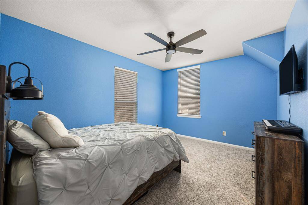 Full bath connects upstairs bedrooms 1 and 2.  Individual vanities for each room.