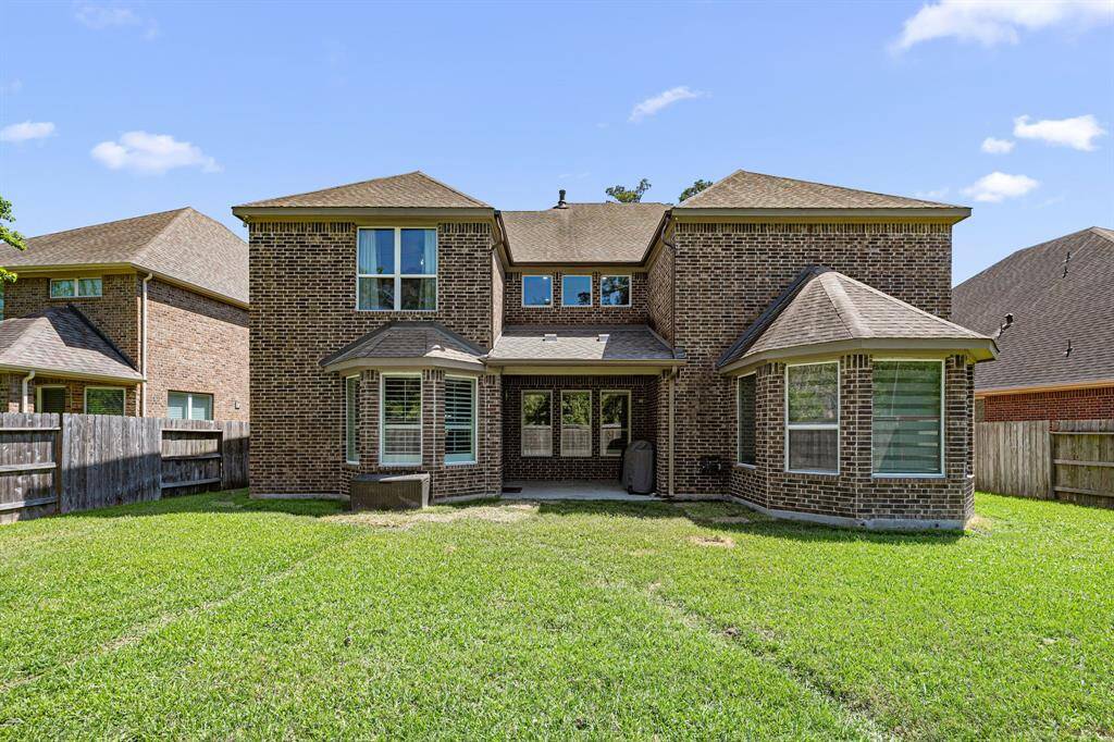 Bonus space, two large storage closets and a door that leads to the attached garage.