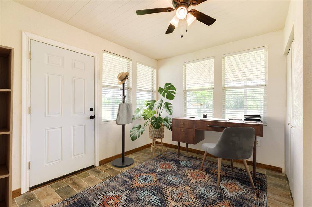 Bedroom Downstairs is Virtually Staged as an Office