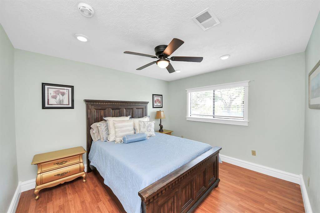 Each of the two upstairs bedrooms offers its own ample space, ensuring everyone has a personalized retreat to call their own.