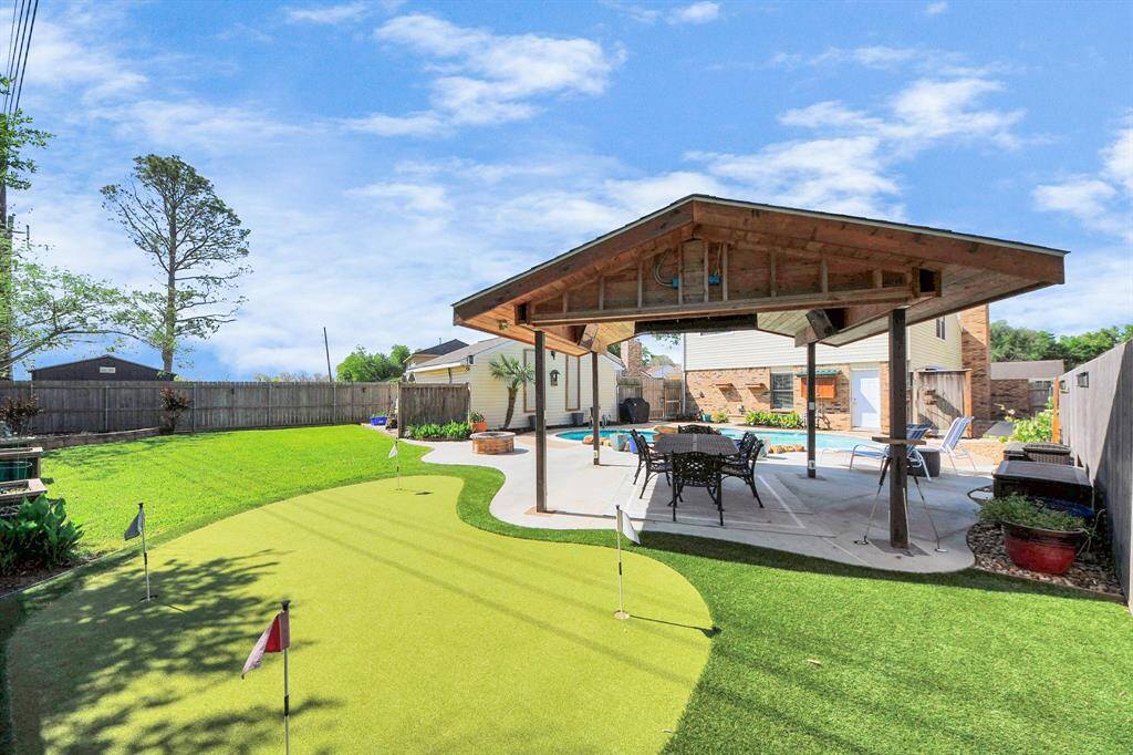 This exceptionally private yard creates the perfect setting for entertaining and outdoor fun. Whether you are hosting gatherings or simply enjoying quiet moments, the seclusion enhances the experience.