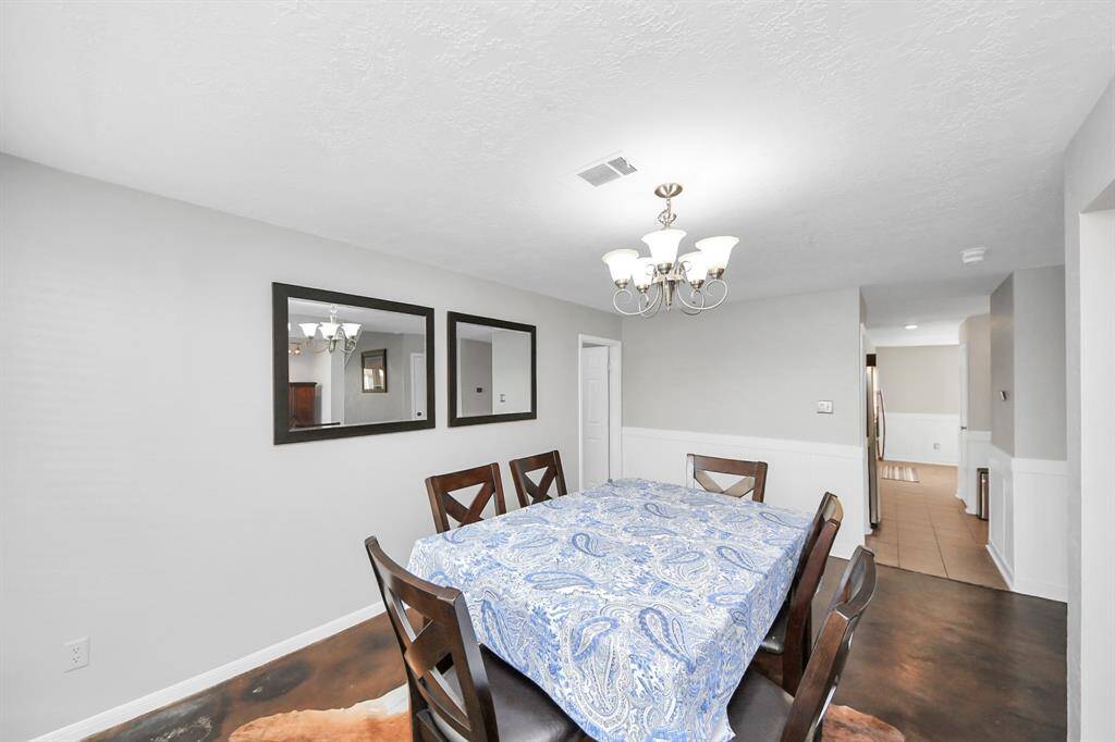 The dining room, conveniently located just off the kitchen, offers a seamless flow for formal meals, holidays and entertaining.