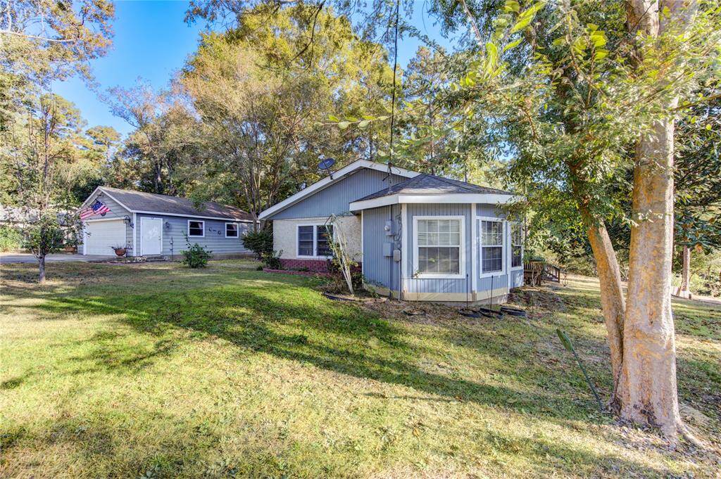 Discover the charm of 257 Broken Arrow Trail, nestled amidst lush greenery for your serene retreat.