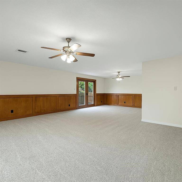 Light-filled flex space with large window and endless layout possibilities.