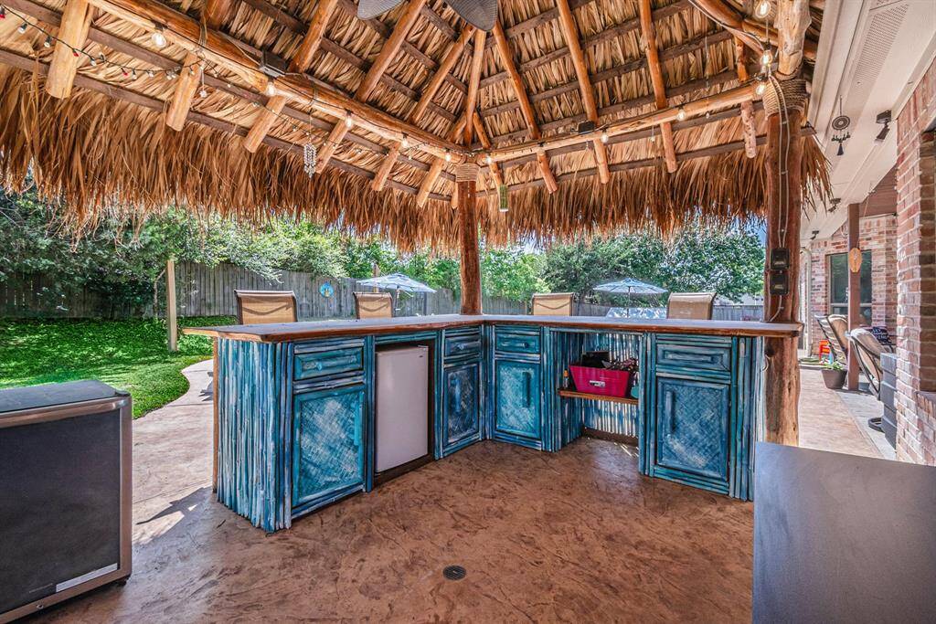 Tiki hut provides shade and great space for entertaining!