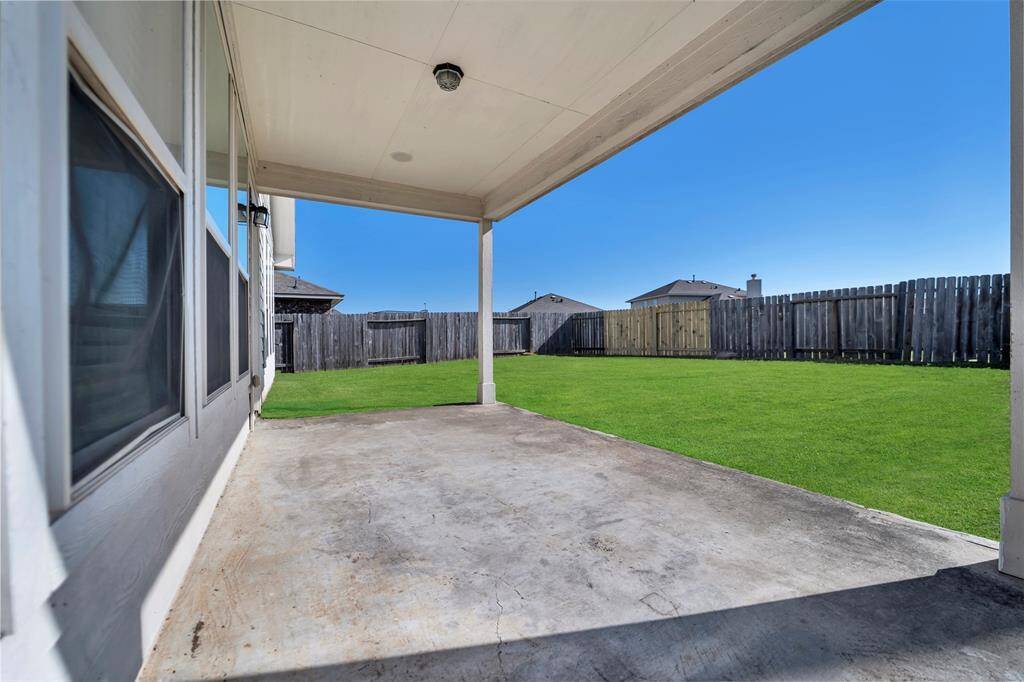 Enjoy outdoor living on the spacious covered back porch.