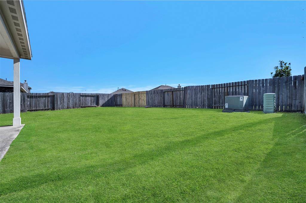 Expansive, lush backyard perfect for outdoor enjoyment.
