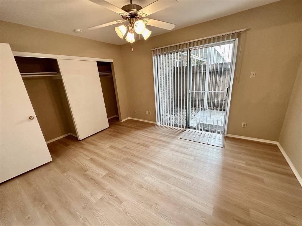 Primary Bedroom overlooks the back patio.