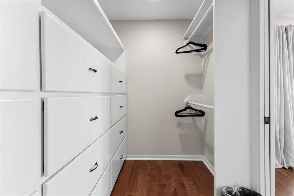 walk in closet with drawers east end bedroom