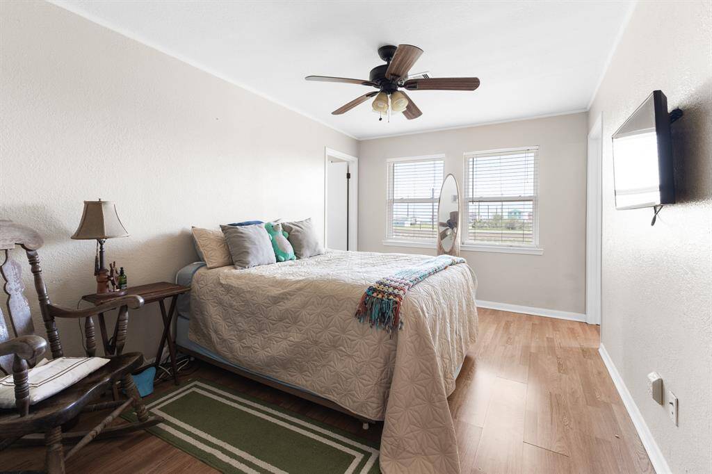 this bedroom has access dors to hall, great room and another bedroom or office.