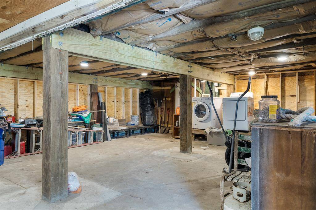 large garage with new pilings and beams.