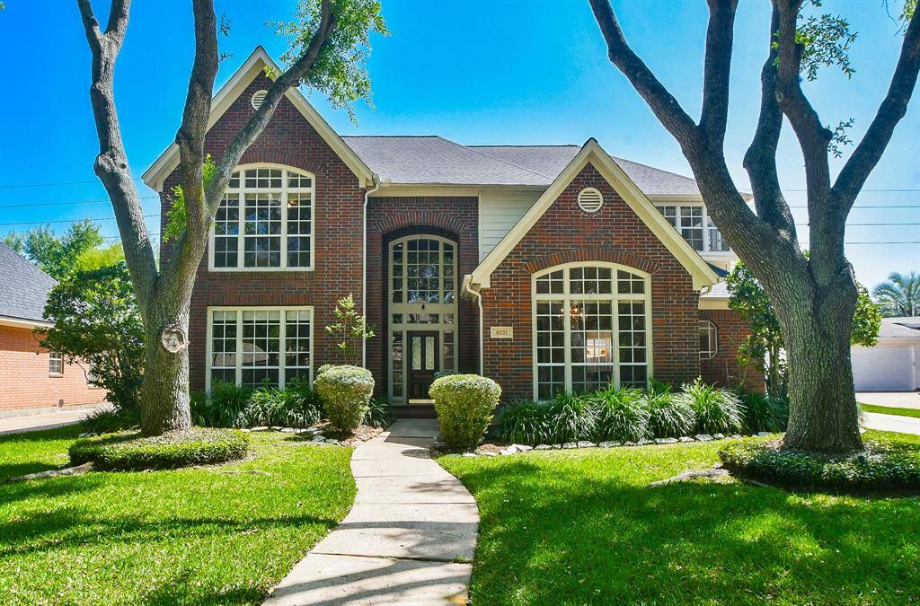 Charming and impeccably maintained home on a sought-after street.