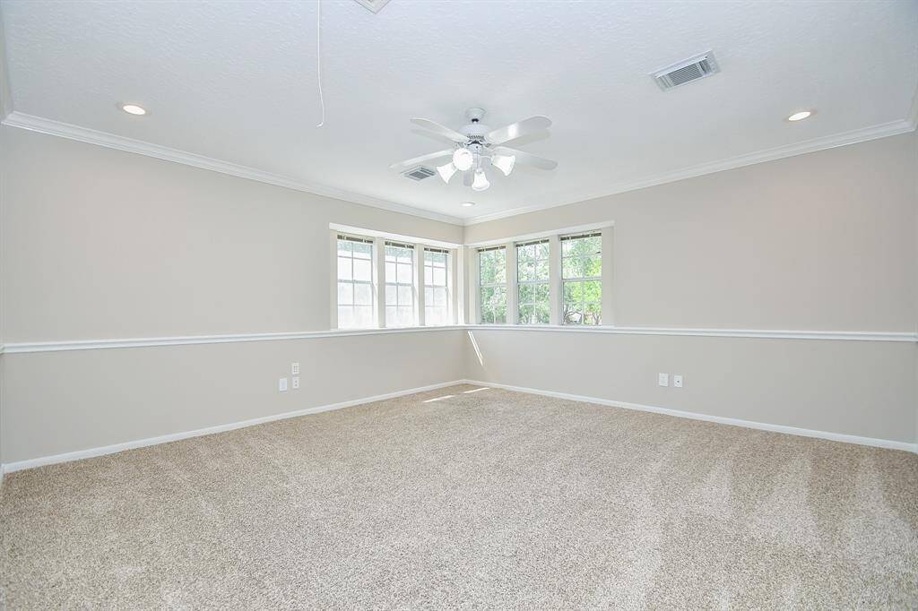 Spacious gameroom on the second floor with lovely natural light