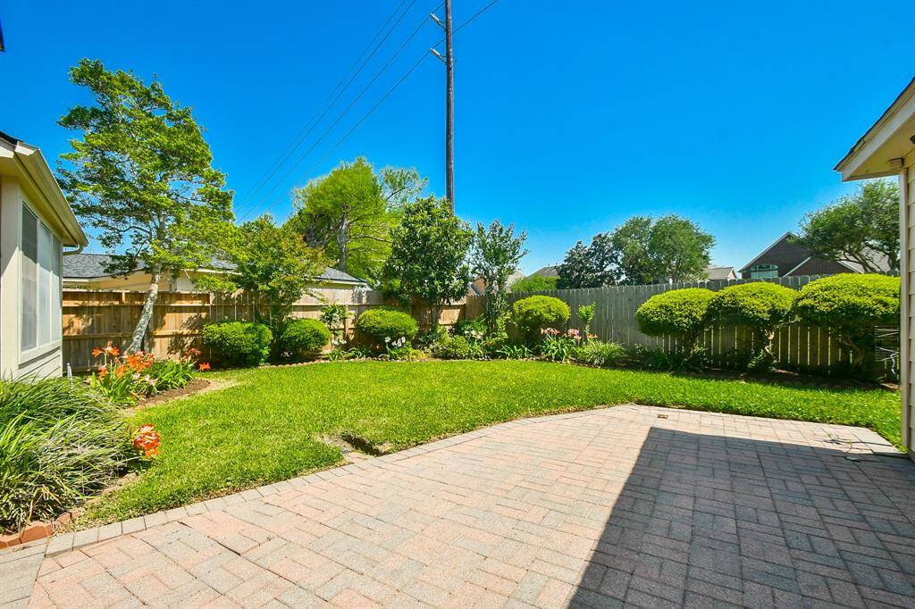 Tranquil backyard oasis with complete privacy and no rear neighbors.