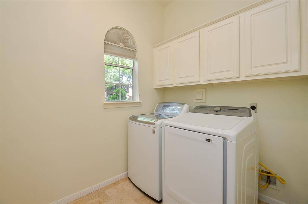Laundry room- washer and dryer stay with the home!