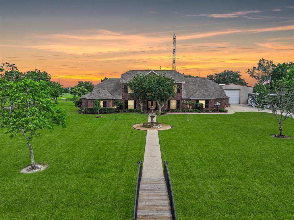 Welcome to 5227 Jeffrey Street! This incredible property in Dickinson offers 2 acres of unrestricted land in addition to a 40'x60' workshop and a 4,547 square-foot custom-built home with a traditional red brick elevation and fabulous updates throughout!