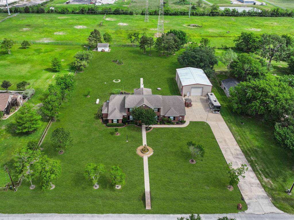 5227 Jeffrey Street is the ideal place to enjoy country living close to city conveniences! It boasts 2 acres of unrestricted property that borders League City and offers quick and easy access to Highway 646 and League City Parkway.