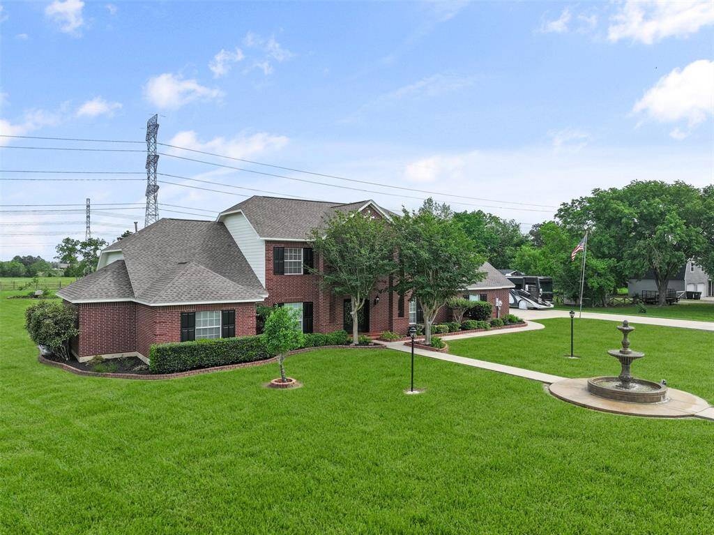 Welcome to 5227 Jeffrey Street! This incredible property in Dickinson offers 2 acres of unrestricted land in addition to a 40'x60' workshop and a 4,547 square-foot custom-built home with a traditional red brick elevation and fabulous updates throughout!