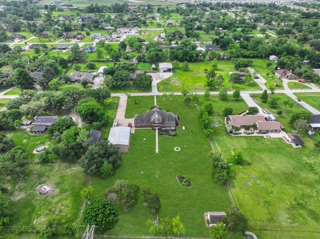 5227 Jeffrey Street is the ideal place to enjoy country living close to city conveniences! It boasts 2 acres of unrestricted property that borders League City and offers quick and easy access to Highway 646 and League City Parkway.