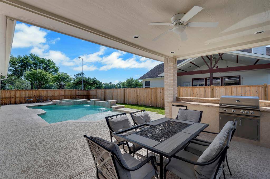 Welcome home to 6003 Tarra Firma in lovely Senterra Lakes.  This Village Builders 5 bedroom 4 full bath home is going to knock your socks off.   And get ready to enjoy being outside this summer with your very own pool, spa, and covered patio with outdoor kitchen.   Wowza!