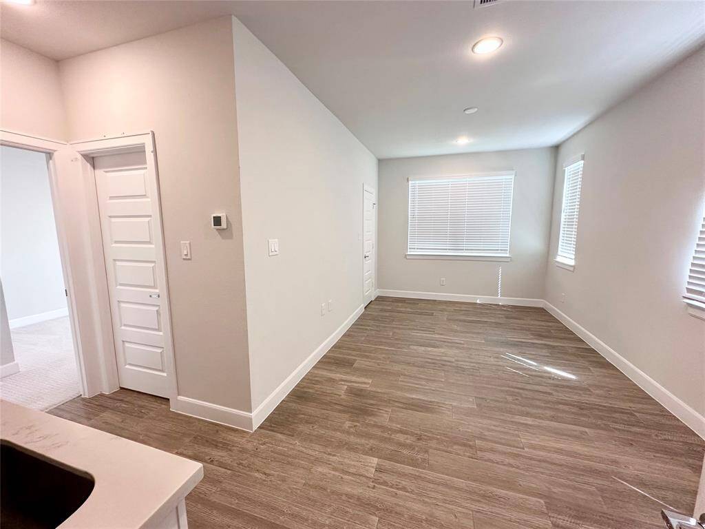 First floor flex room can be living area, office, third bedroom, etc.