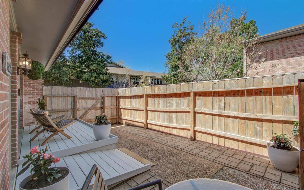 view of large private patio from dining area
